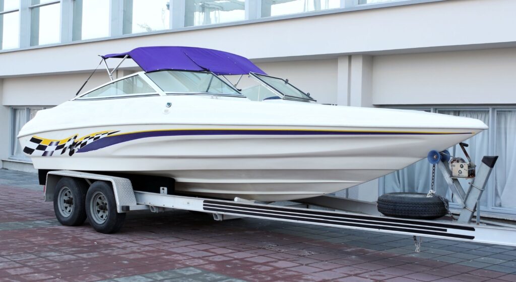 speed boat on aluminum boat trailer
